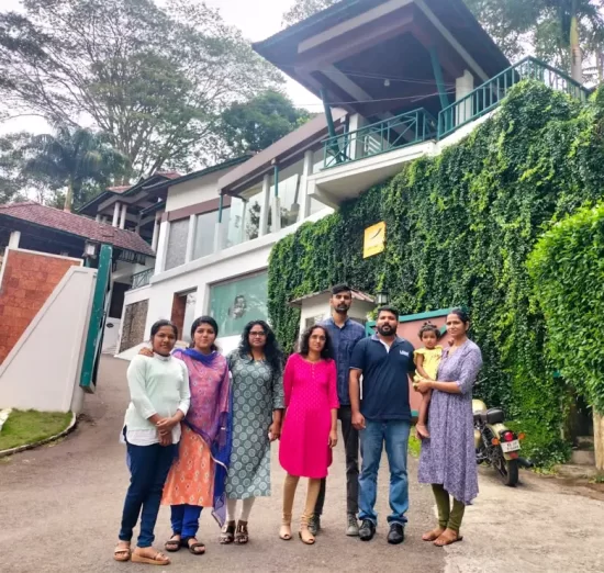 Happy guest at forest canopy resort kerala